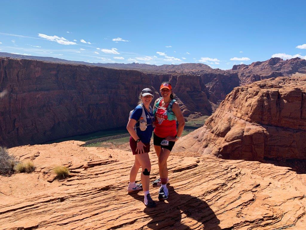 Standing atop Horseshoe Bend in Utah during the Antelope Canyon 50 miler.