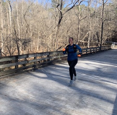 Crossing a frosty bridge in Umstead Park in Raleigh, NC.