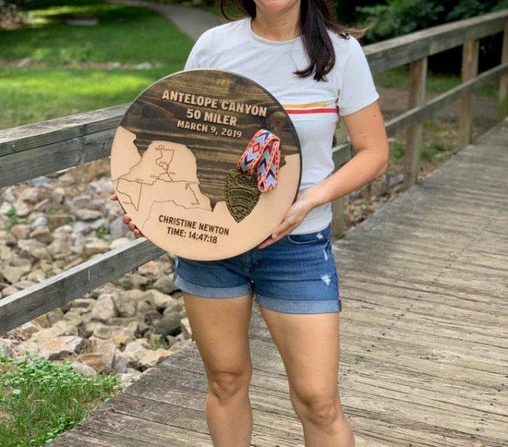 Standing with my wooden Antelope Canyon 50 miler medal display.